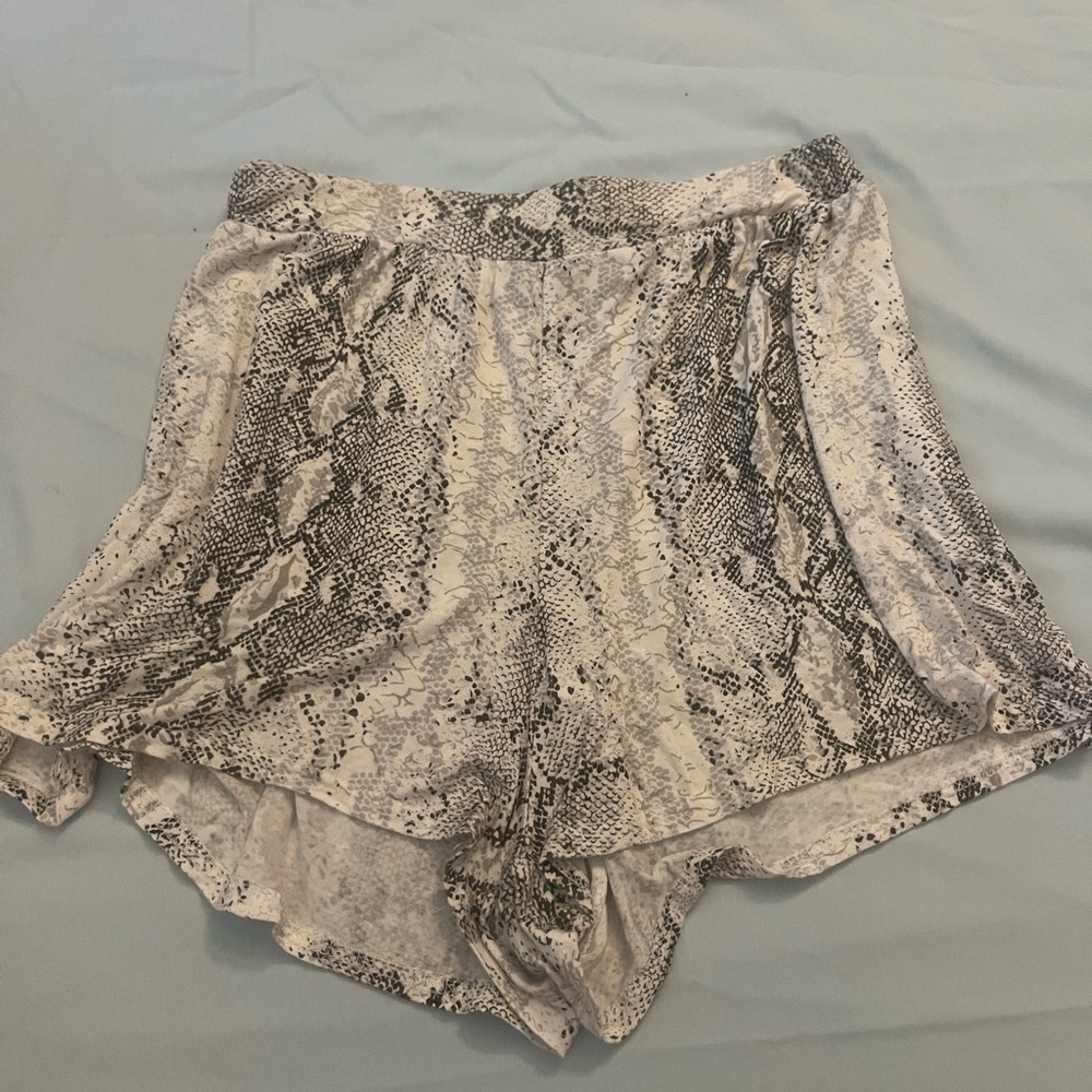 Flowy snakeskin shorts.